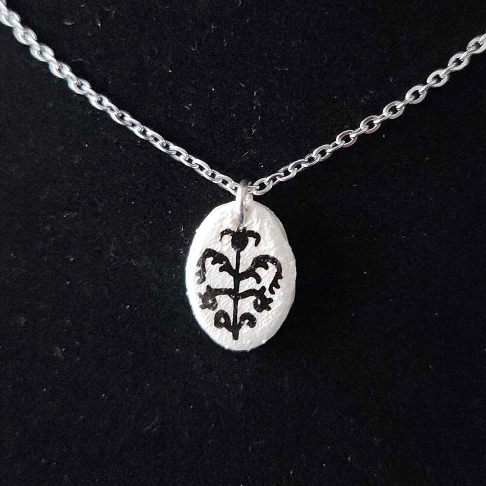 Iridescent Victorian Goth necklace with a small silver chain